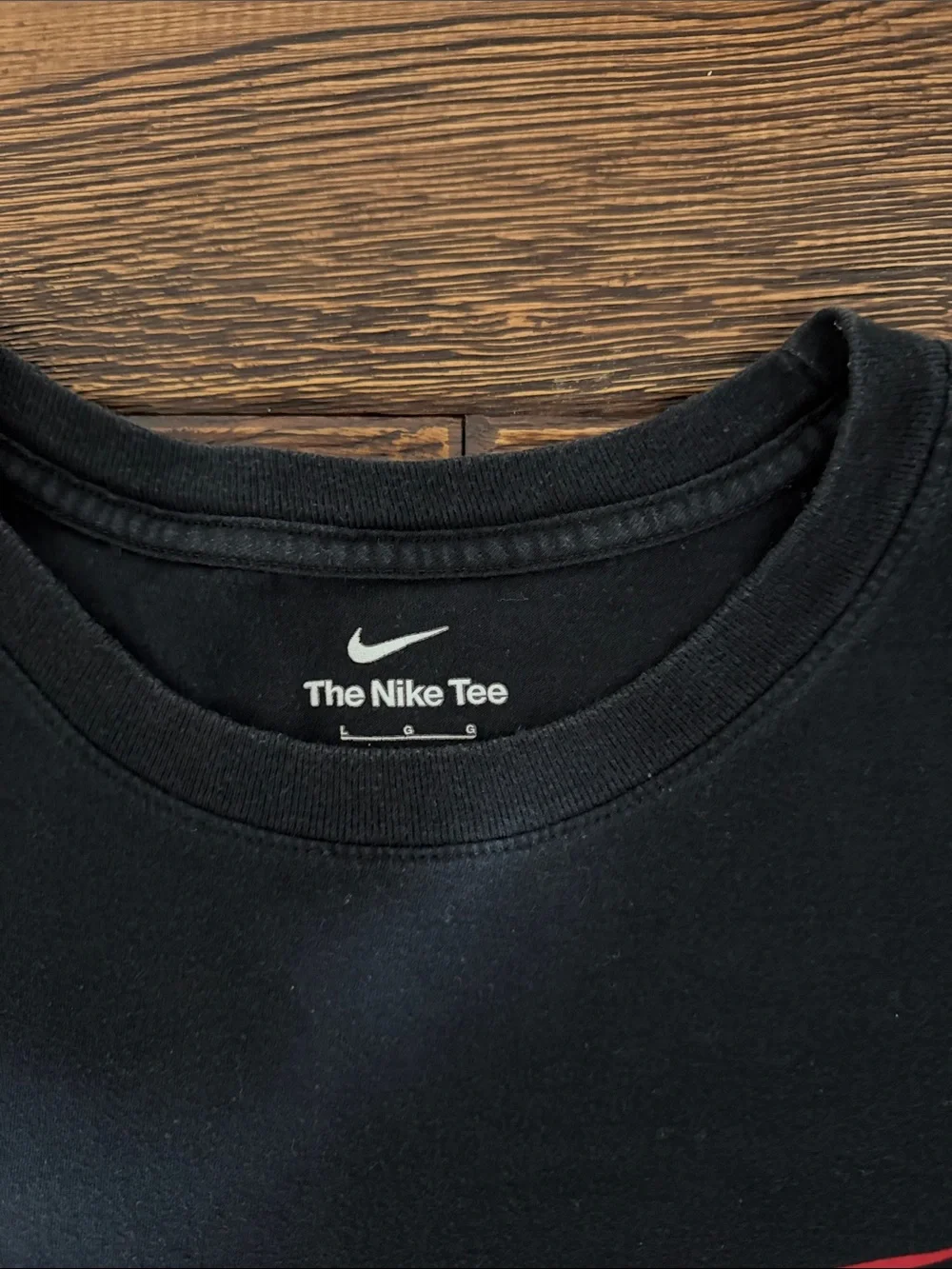 Nike Black Short Sleeve Tee with Red Swoosh Logo